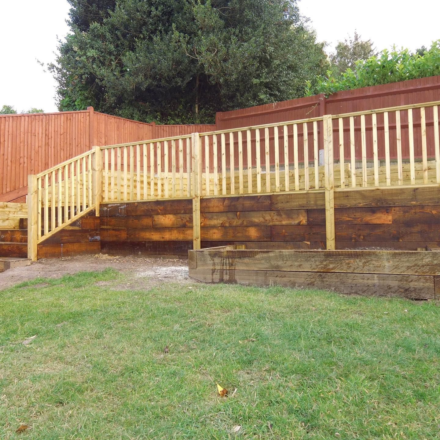 Wooden decking with bannisters 